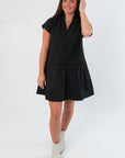 Front view of THML Elise Black Suede Mini Dress featuring a flared skirt and soft suede texture, perfect for day-to-night wear.