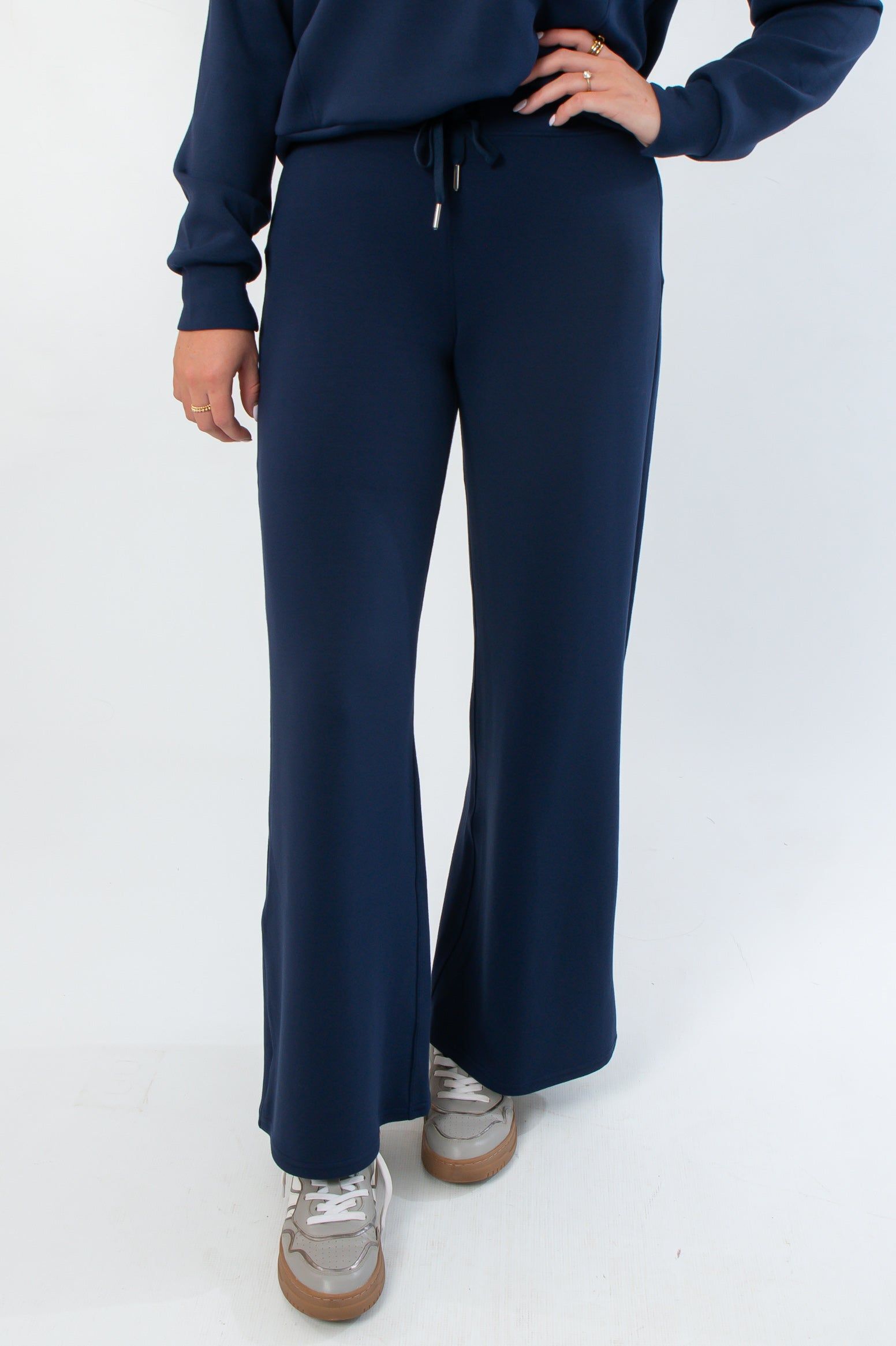 Spanx AirEssentials Timeless Navy Wide Leg Pant with drawstring waist and relaxed fit, ideal for loungewear or casual outings.
