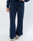 Spanx AirEssentials Timeless Navy Wide Leg Pant with drawstring waist and relaxed fit, ideal for loungewear or casual outings.