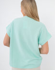 Back view of seafoam ribbed knit short sleeve pocket tee