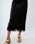 Professional fall office attire for women, black midi skirt for women, black skirt for the office, black work skirt