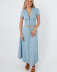 Light blue denim cropped top and maxi skirt set with button details, casual spring outfit