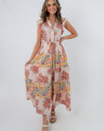 Front view of Peach Patchwork Floral Maxi Dress with colorful floral pattern