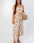 Heirloom Pumpkin Harvest Strapless Midi Dress - L Mae Boutique, styled with woven bag and sandals, perfect for festive fall occasions.