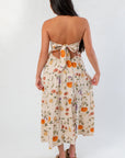 Heirloom Pumpkin Harvest Strapless Midi Dress from behind, showcasing tie-back design and festive pumpkin print for Thanksgiving style.
