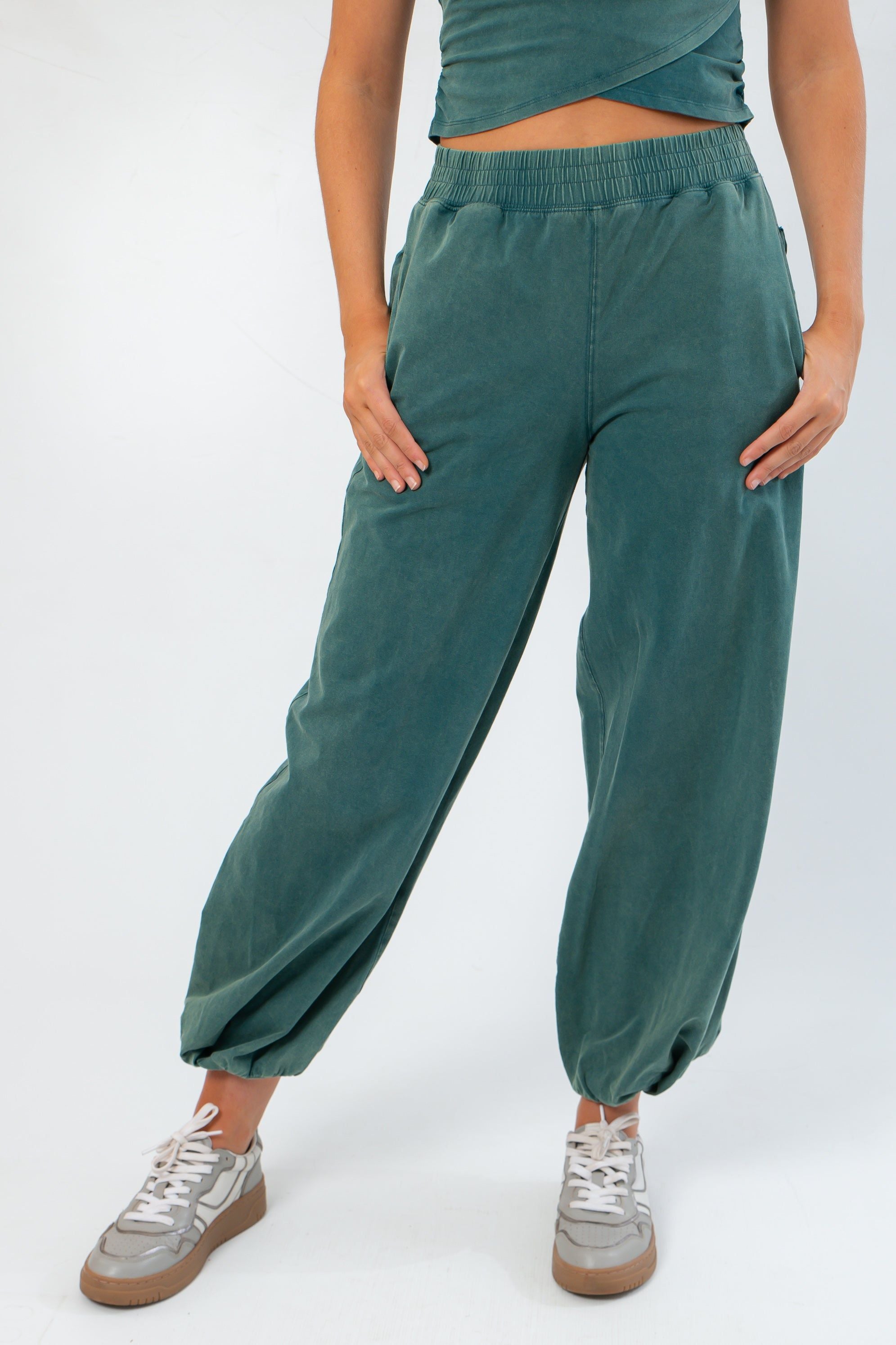 Close-up of Teal Jogger Sweatpants showcasing relaxed fit, side pockets, and soft fabric ideal for lounging or casual outings.