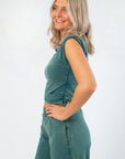 Side view of Teal Crop Top - Short Sleeve showing wrap detail and flattering fit, great for casual and fall wardrobe updates.