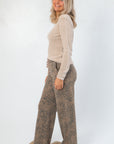 Side profile of Z Supply Desert Tan Arlet Mini Thermal Top showing its slim fit and ribbed texture, styled with relaxed leopard print pants.