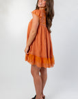 Side view of Amber Romance Lace Babydoll Dress highlighting flutter sleeves and flowy southern charm design.