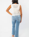 Back view of the Gia Crochet Shell Knit Tank features a sleeveless white crochet design with pastel shell patterns, perfect for effortless summer beachwear.