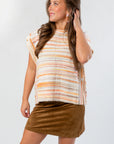 Side button detail on Harvest Spice Stripe Sweater Vest – Cozy Fall Knit Vest L Mae Boutique, paired with autumn-ready suede skirt.