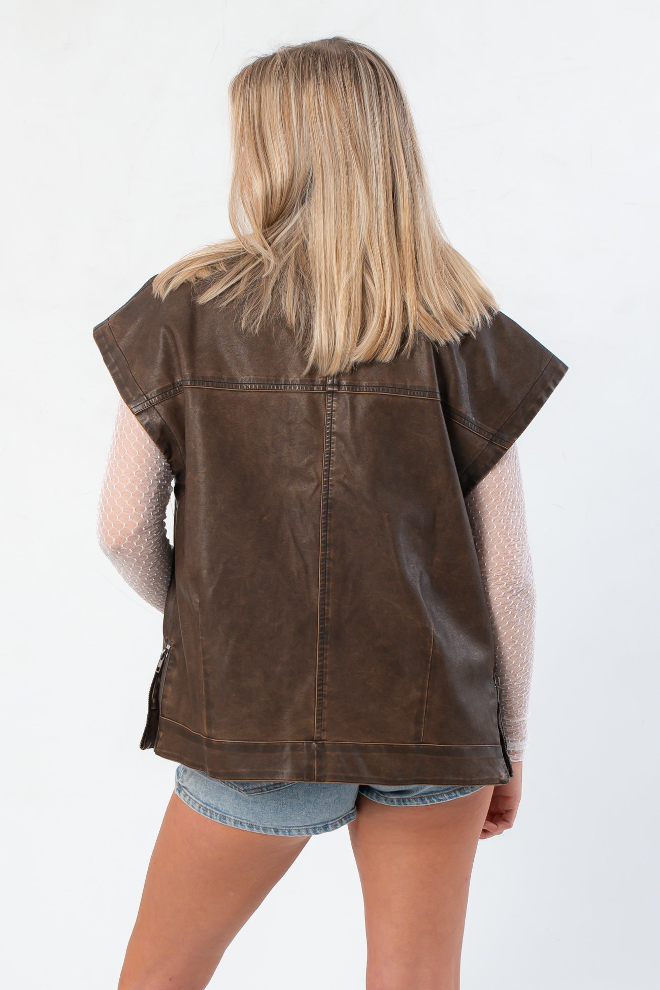Back view of Bittersweet Chocolate Brown Faux Leather Oversized Vest – Modern Style highlighting oversized cut and smooth faux leather finish.