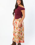 Wildflower Waltz Floral Printed Midi Slip Skirt - Wild Mabel Clothing styled with burgundy top and brown boots. Lightweight fall midi skirt with vintage floral print.