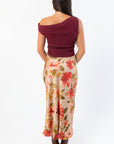 Back view of Wildflower Waltz Floral Printed Midi Slip Skirt - Wild Mabel Clothing, featuring a beige base with red and green floral print, styled for fall fashion.
