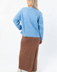 Back view of Lorelai Blue Marbled Round Neck Sweater highlighting its soft knit and relaxed silhouette, perfect for cozy casual wear.