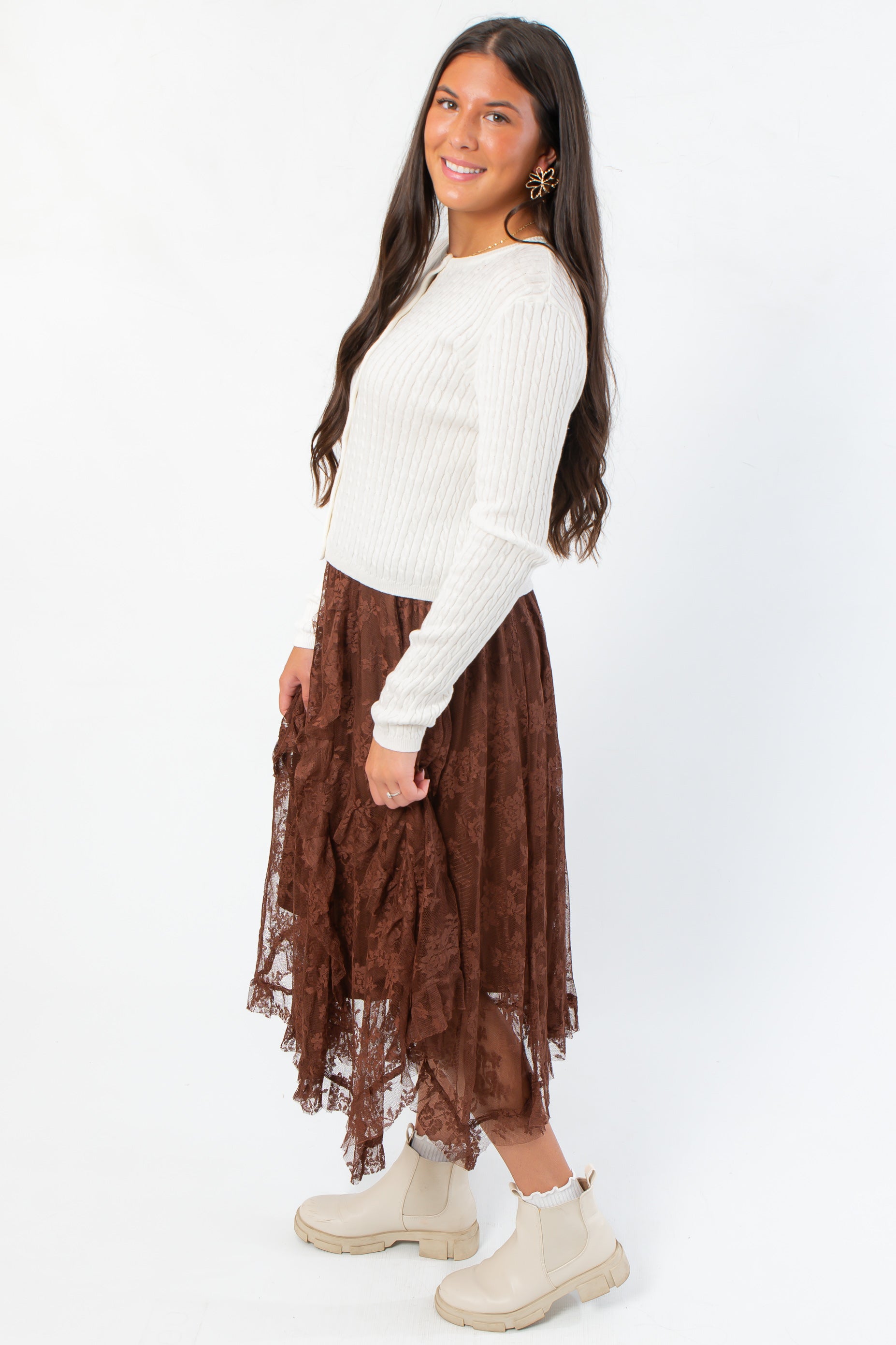Side view of Serene Mocha Lace Maxi Skirt showcasing its flowy, layered lace design in a chic mocha tone.