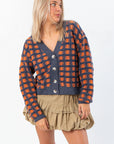 Front angle of Blue Ridge Plaid Checkered Cardigan featuring large buttons and textured plaid knit, perfect for autumn layering.