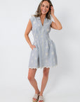 Blue and white embroidered dress with smocked waist and scalloped hem