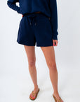 Spanx Air Essentials shorts styled with coordinating matching quarterzip