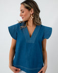Back view of denim twill blue short sleeve blouse with contrast stitching, women's fashion top