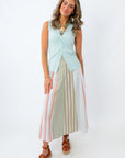 mint knit top styled with summer midi skirt and statement necklace