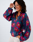 Lightweight fall workwear blouse with ruffle collar, THML long sleeve blouse, THML blue floral blouse