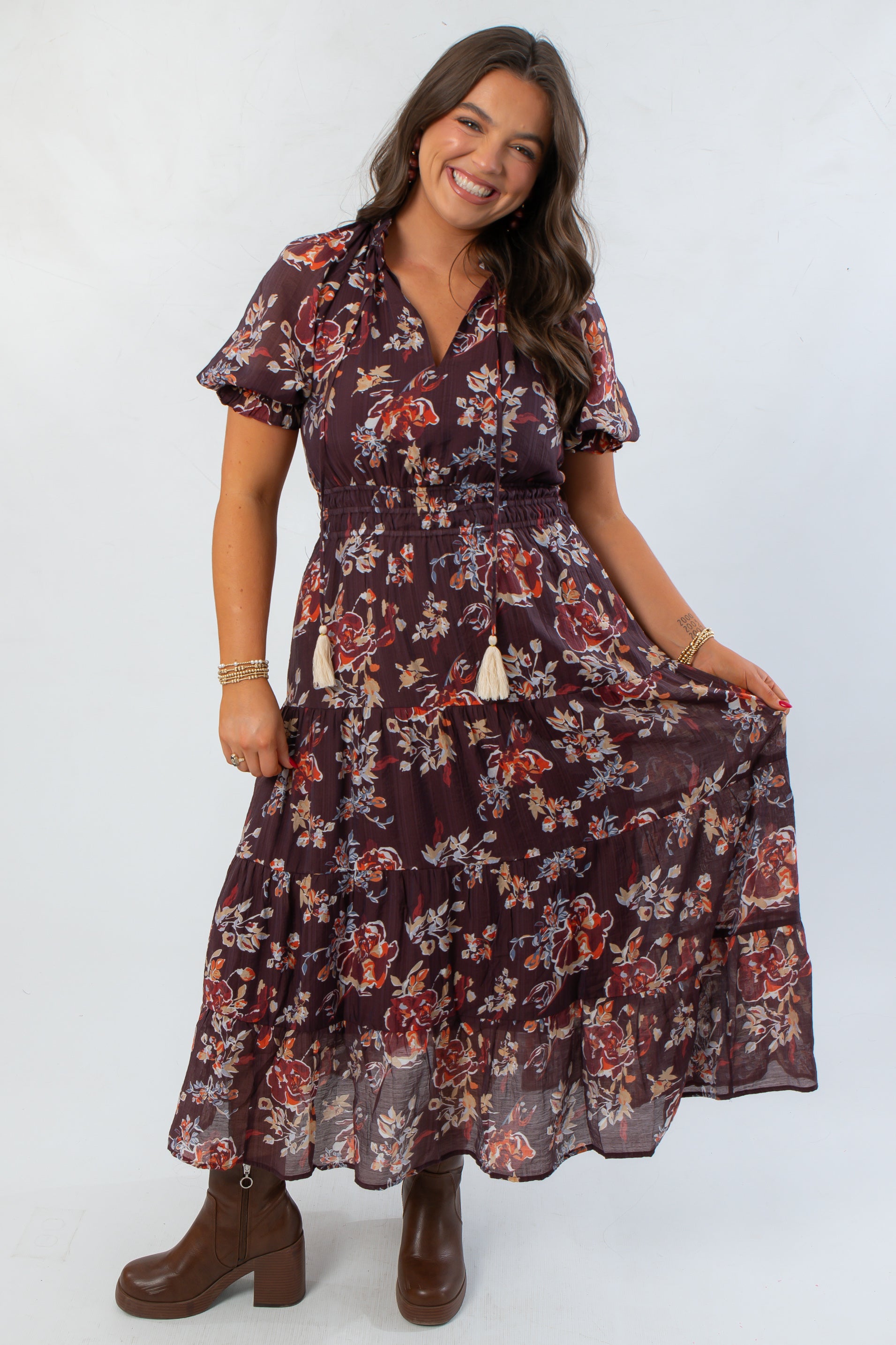 Front view of THML Burgundy Printed Puff Sleeve Tiered Maxi Dress featuring tiered skirt and puff sleeves, ideal for casual fall occasions.