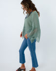 Sage green fall top with wave hem and sleeves, top with wavy sleeves, sage green top with long wavy sleeves