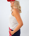 casual henley tank top for jeans and shorts styled with american flag shorts and trucker hat