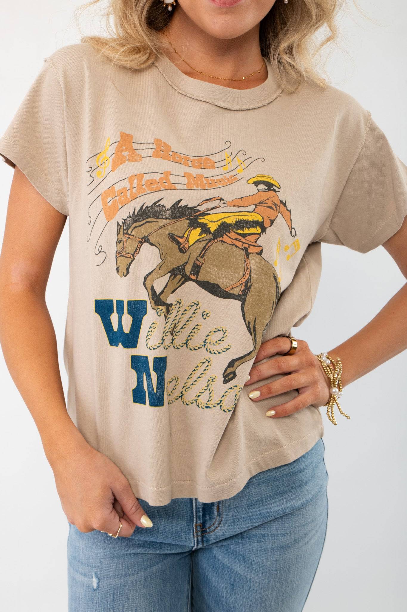 Close-up of the Daydreamer Willie Nelson 'A Horse Called Music' Graphic Tee, highlighting the vintage-style horse and text graphic design.