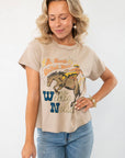 Daydreamer Willie Nelson 'A Horse Called Music' Graphic Tee in beige with vintage country-inspired artwork, styled with blue jeans.