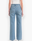 Rear view of Daze Denim Far Out High Rise Studded Jeans displaying classic back pockets and a structured high-waisted fit.