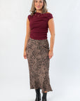 Front view of Z Supply Desert Tan Izabel Leopard Skirt paired with a sleeveless top. Features elastic waistband and flattering silhouette.