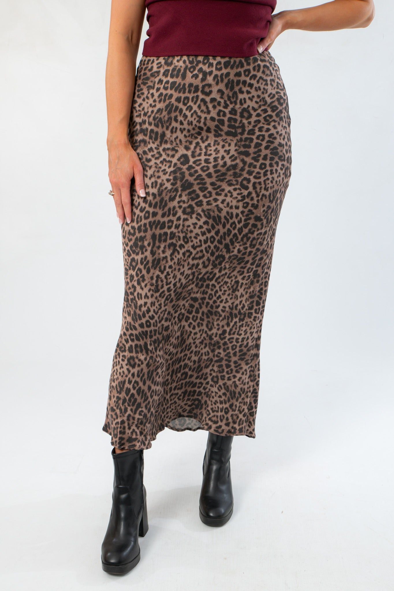 Close-up of Z Supply Desert Tan Izabel Leopard Skirt showcasing stretch satin fabric and bias cut fit in a stylish leopard print design.