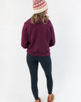 Back view of Spanx Very Black Full Length Leggings demonstrating flattering fit and high-rise waistband for women’s slimming style.