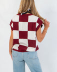 Back view of Checkmate Burgundy Sweater Vest showing oversized checker pattern and relaxed fit, ideal for transitional fall outfits.