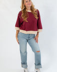 Vickie Sweatshirt - Burgundy Cream Contrast styled with cuffed jeans and sneakers. Cozy oversized fit perfect for casual fall days.