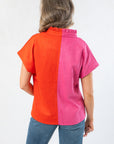 Back view of THML Orange & Pink Colorblock Suede Top with ruffled collar detail and bold color contrast for a standout look.