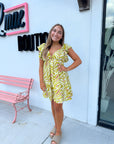 The Sahara Yellow Printed Tie Back Mini Dress