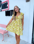 The Sahara Yellow Printed Tie Back Mini Dress