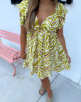 The Sahara Yellow Printed Tie Back Mini Dress