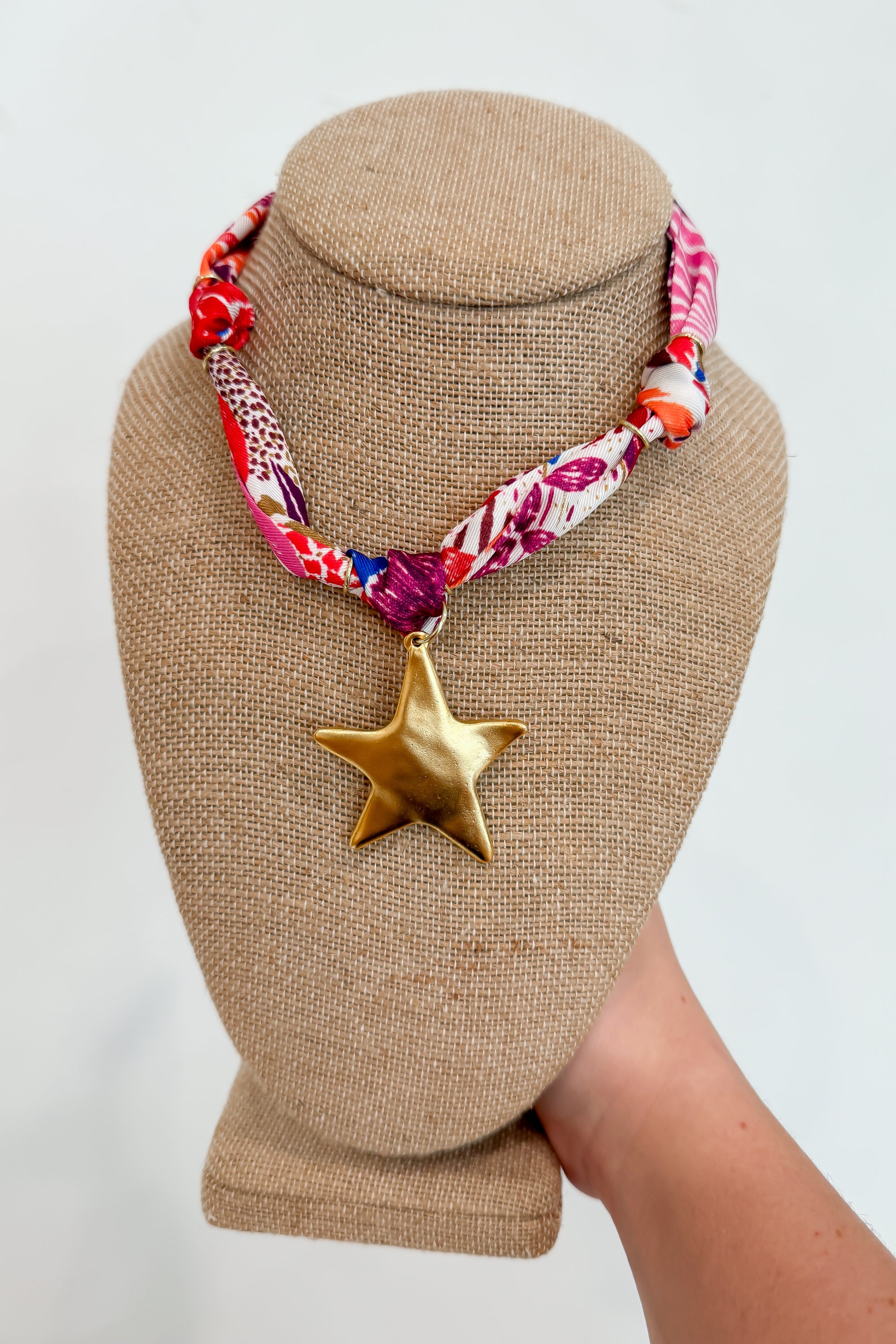 Clemson Scarf Necklace with vibrant orange and purple bandana fabric and a gold star charm pendant, perfect for gameday accessories.