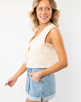 Side profile of the Jolene Beige Embroidered Tie Top Vest, highlighting its sleeveless design and lightweight fabric for an airy, summer-ready feel.