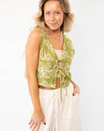 Jolene Matcha Embroidered Tie Top Vest featuring delicate embroidery and a front tie closure, adding a boho-chic touch to any summer wardrobe.