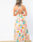 Back view of the Moroccan Coast Tile Print V-Neck Maxi Dress showcasing a stylish open-back crisscross design, ideal for warm-weather getaways.