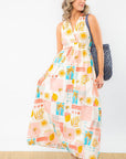 Moroccan Coast Tile Print V-Neck Maxi Dress with a vibrant resort-ready design, featuring a flowy skirt and side pockets for effortless summer style.
