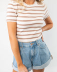 Close-up of the Next Up Taupe Striped Knit Crop Top, showcasing its ribbed knit texture, taupe and white stripes, and flattering cropped fit.