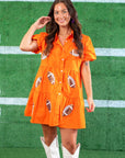 Make a statement with the Orange Sequin Football Dress, a trendy shirt dress with a tiered skirt, button-up front, and football-themed sequins.