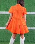 Back view of the Orange Sequin Football Dress, showcasing its tiered design, puff sleeves, and comfortable fit for a stylish game day look.
