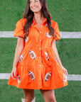 Stand out on game day with the Orange Sequin Football Dress, featuring a button-up design, short sleeves, and football sequin details.